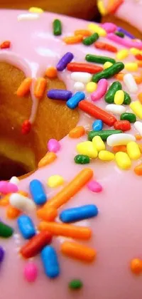 Looking for a bright and cheerful live wallpaper for your phone? Check out this unique doughnut design! Featuring a close-up shot of a colorful sprinkle doughnut, this wallpaper is aesthetically pleasing and playful
