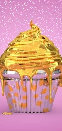 This live phone wallpaper features a 3D golden iced cupcake on a soft pink background