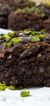 This phone live wallpaper showcases a close-up of a tempting chocolate cake on a plate