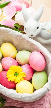 This lively and colorful Easter wallpaper for phones features a basket overflowing with intricately designed eggs in delicate pastel shades