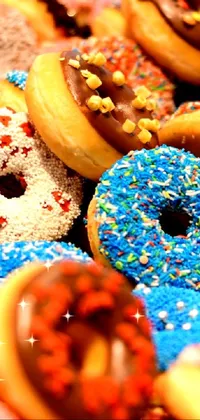 Indulge in a sweet treat with this phone live wallpaper depicting a pile of donuts covered in colorful sprinkles and icing drizzles