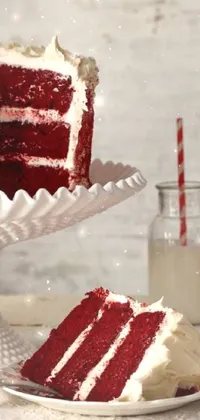 This phone live wallpaper boasts a decadent red velvet cake with rich, creamy frosting and a slice removed for detail