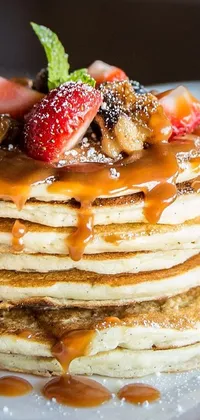 If you're looking for a delicious, mouth-watering live wallpaper for your phone, then the stack of pancakes on this wallpaper is sure to satisfy your appetite
