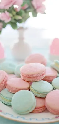 This phone live wallpaper offers a close-up view of a plate of macarons