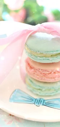 Enhance your phone's look with this vibrant live wallpaper featuring a plate full of tasty macarons