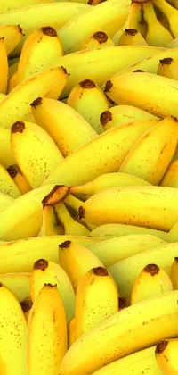 Get a playful and retro vibe on your phone's home screen with this detailed zoom photo live wallpaper of a pile of bananas