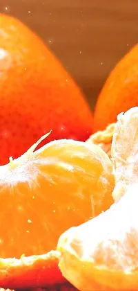 This live wallpaper features a stunning photorealistic painting of two oranges resting on a table
