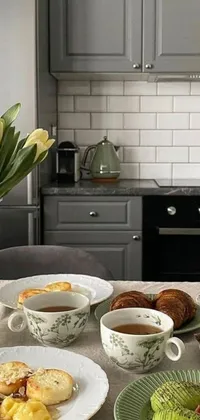 This phone live wallpaper features a grey color scheme and depicts a realistic scene of a table topped with plates of food