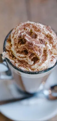 Get ready to add some bold and tasty vibes to your phone screen with this close-up live wallpaper of a cup of coffee (or hot cocoa, if you prefer)