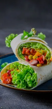 This phone live wallpaper showcases a tantalizing burrito on a vibrant blue plate paired with a fresh salad