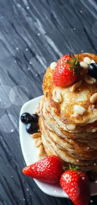 This live wallpaper features a stack of pancakes on a white plate, topped with juicy berries and healthy seeds