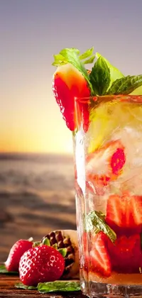 This phone live wallpaper boasts a stunning photorealistic painting of a drink on a wooden table beside the ocean