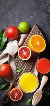 Bring a burst of color and energy to your phone screen with this magnificent live wallpaper! Featuring a wooden cutting board lined with juicy oranges and limes, this wallpaper exudes a refreshing and rejuvenating vibe