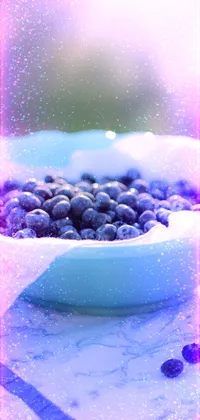 Enhance your phone's display with this charming live wallpaper that features a rustic tabletop adorned with a delightful bowl of blueberries and a cup of coffee