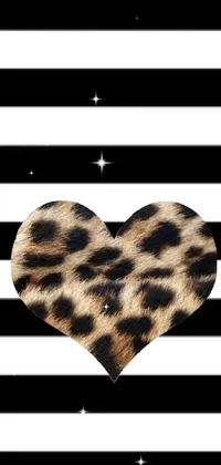 Enhance the look of your phone with this stylish live wallpaper featuring a leopard print heart placed on a black and white striped background