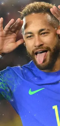 Get a fun and animated live wallpaper for your phone featuring a well-known soccer player posing hilariously with his hands