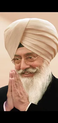 This live wallpaper features a close up view of a person wearing a turban