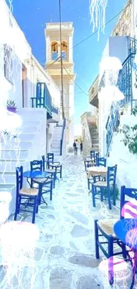 This stunning phone live wallpaper features a quaint street with tables and chairs under a warm glowing lamp
