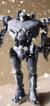 This live phone wallpaper features a close-up of a futuristic toy robot