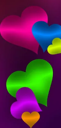 This live phone wallpaper features a beautiful design of metallic heart shapes floating gracefully on top of each other, with neon-colored silk flowing in between them