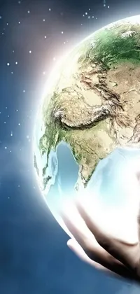This stunning phone live wallpaper shows a digital art featuring a person holding a glowing globe in their hands