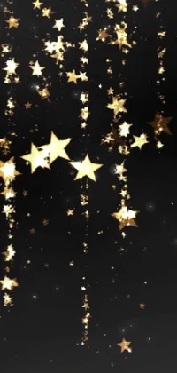 This live phone wallpaper features a stunning black background with a myriad of gold stars, complemented beautifully by dripping light drops and a ballroom background