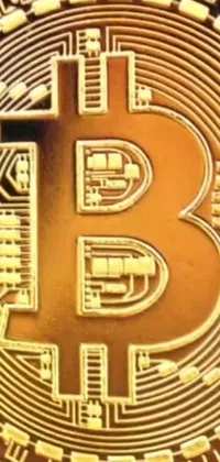 This phone live wallpaper depicts a stunning gold bitcoin sitting on a bold green table
