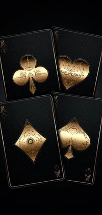 This live phone wallpaper features four playing cards stacked on top of each other, made of polished bronze, with a "diamonds, clubs, hearts, and spades" text displaying on-screen