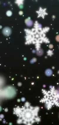 This stunning live wallpaper features a black background with a flurry of snowflakes created in beautiful digital art