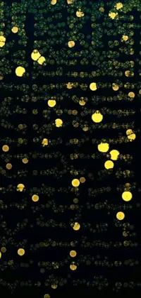 Introducing a stunning live wallpaper for your phone, featuring gold dots on a black background in a design reminiscent of microscopic photography