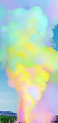 This phone live wallpaper features a mesmerizing rainbow-colored cloud against a clear blue sky, designed in an artistic and unique style with synchromism and fluid-colored smoke