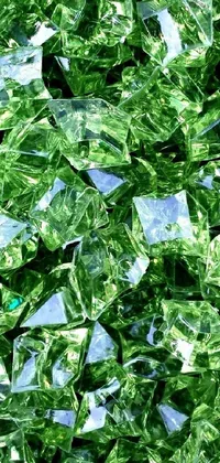 This stunning live phone wallpaper features close-ups of beautifully rendered green crystals