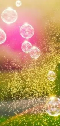 Looking for a mesmerizing, pink and gold phone live wallpaper? Check out this digital artwork by Niko Henrichon trending on Pixabay! Featuring a bunch of bubble shapes and sizes, glimmering golden hour firefly wisps, fairy dust sprinkles, and sparkling glitter particles, this wallpaper is a stunning organic and dynamic masterpiece