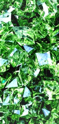 Marvel at the stunning green crystals displayed on this live wallpaper for your phone