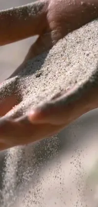 This phone live wallpaper captures the delicate beauty of sand in exquisite detail