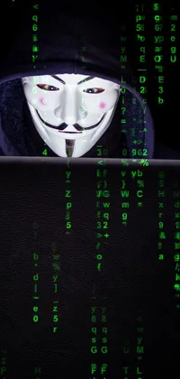 This phone live wallpaper showcases an intriguing image of a masked individual seated in front of a laptop