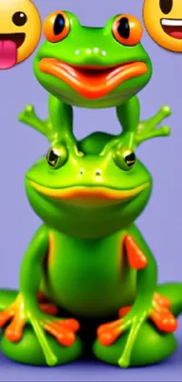 Get this fun and colorful animated phone wallpaper of two frogs sitting on top of each other