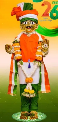 This live wallpaper features a stunning digital rendering of a statue depicting a man dressed in traditional Indian attire against a vibrant green and orange backdrop