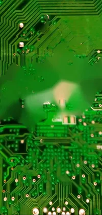 Transform your phone's screen with a captivating live wallpaper featuring a green circuit board in an Oriental-style design