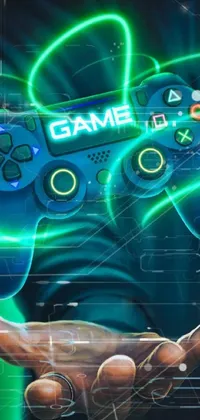 Get ready for a thrilling smartphone experience with a live wallpaper featuring a man playing a video game with a controller in hand! The wallpaper showcases a colorful screenshot of the game displayed on the phone and is dominated by shades of blue and green, reflecting the fast-paced gameplay