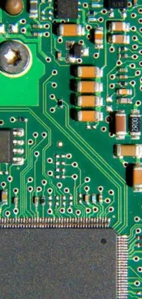 This phone live wallpaper showcases a close-up of a computer board's electronic components, including a microprocessor chip