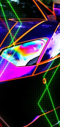 This phone live wallpaper boasts a stunning purple and orange sports car parked in a modern parking lot, complete with a futuristic holographic sheen