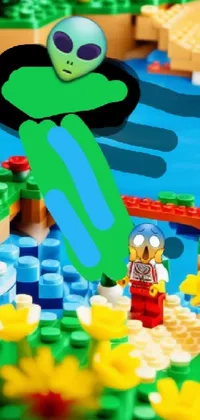 This vibrant phone live wallpaper showcases a close-up of a lego toy, with a sword stuck in a pond island in the background