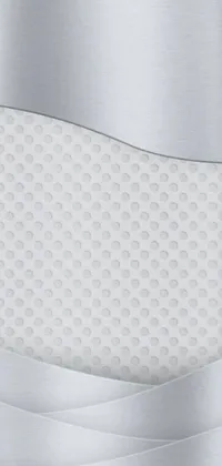 Get mesmerized by this unique phone live wallpaper featuring a metal plate with an abstract holescape pattern