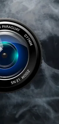 This phone live wallpaper features a stunning macro photograph of smoke coming out of a camera lens