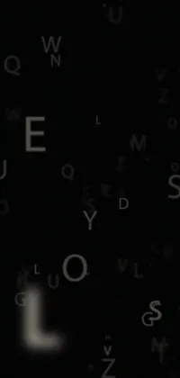 This phone live wallpaper features a keyboard up-close with floating letters, creating a letterist style for your device
