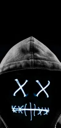 Get lost in the dark and mysterious world of this stunning live wallpaper, featuring a hoodie-wearing figure and mesmerizing graffiti