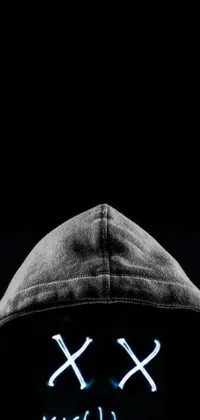 This digital art live wallpaper features a close up of a person in a black hoodie with intelligent eyes