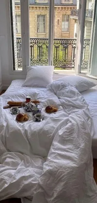 This live phone wallpaper depicts a serene bedroom setting with a wooden floor and a bed next to a window