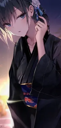 This live phone wallpaper showcases a woman wearing a traditional kimono while on her cell phone